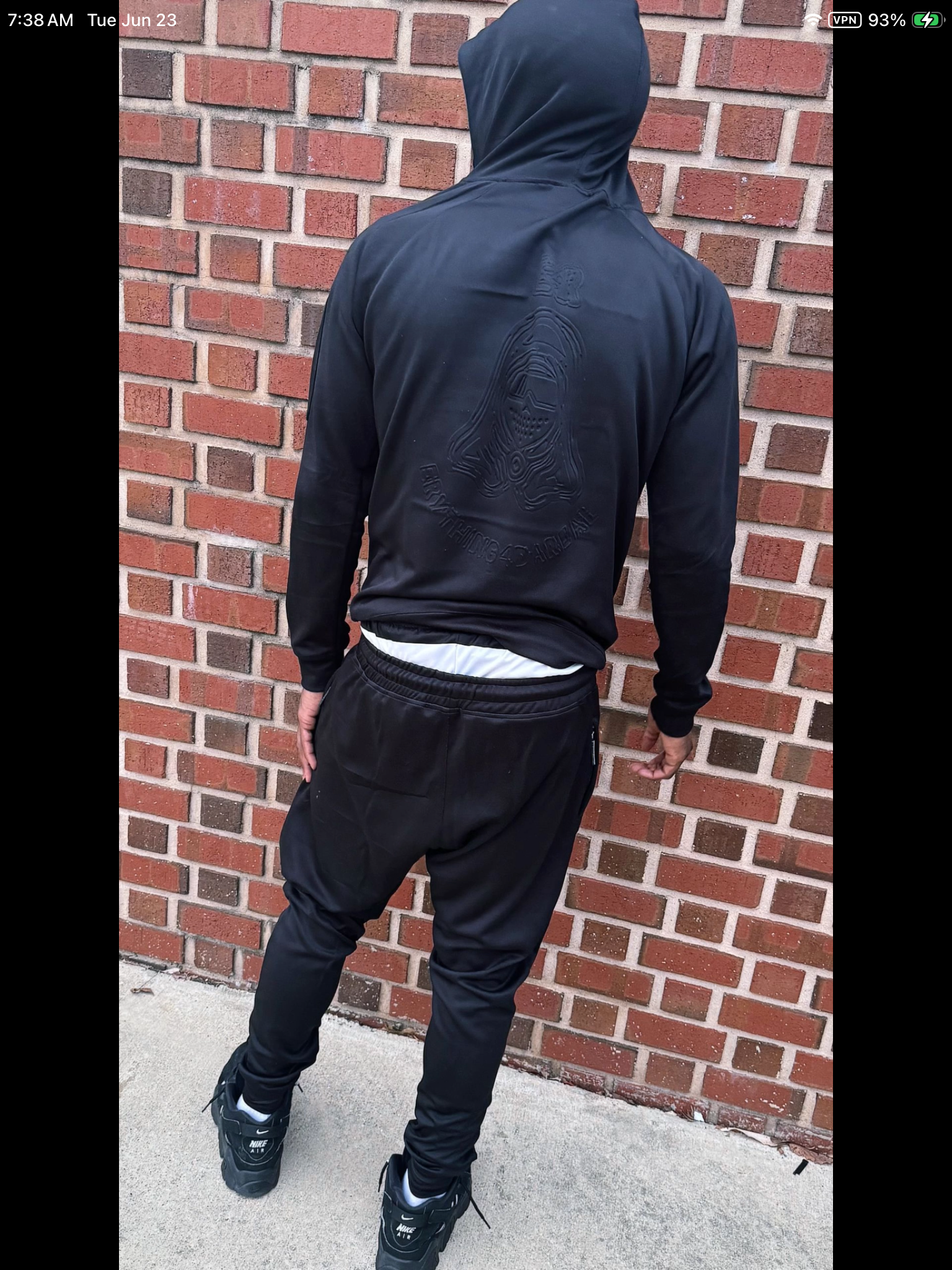 Hoodie Back Detail — Embossed E4R Emblem